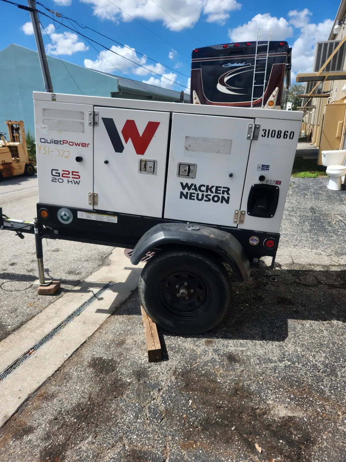 Towable Wacker Neuson diesel generator parked outside the shop — Tri County Small Engine Repair in Cape Coral